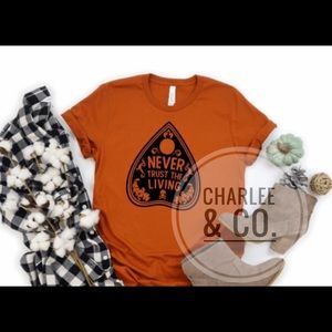 Never Trust the Living Graphic Tee